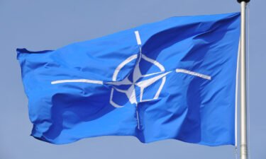 NATO flag flying at NATO Headquarters Brussels. For the first time ever