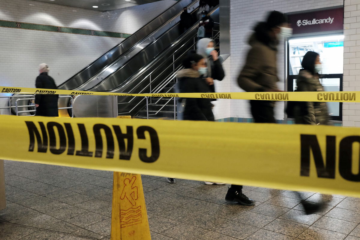 <i>Spencer Platt/Getty Images</i><br/>People walk through a subway station in Manhattan