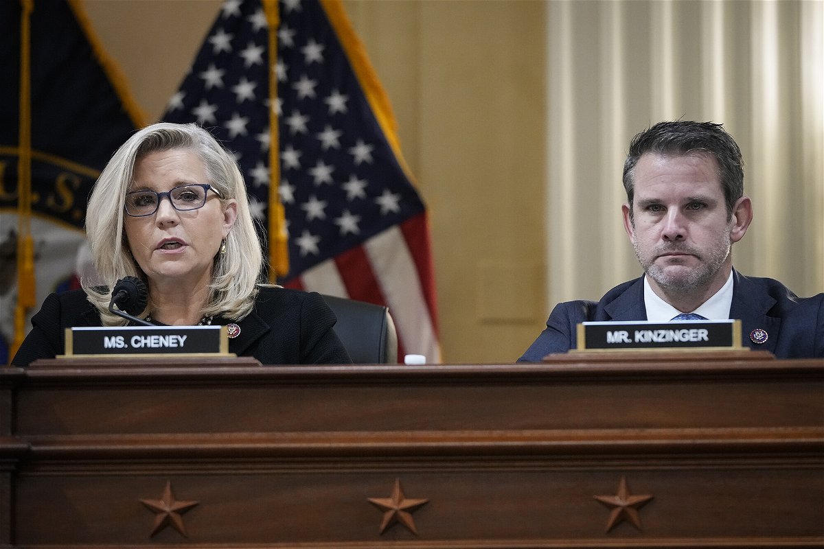 <i>Drew Angerer/Getty Images</i><br/>Rep. Liz Cheney and Rep. Adam Kinzinger listen during a committee meeting on Capitol Hill on December 1