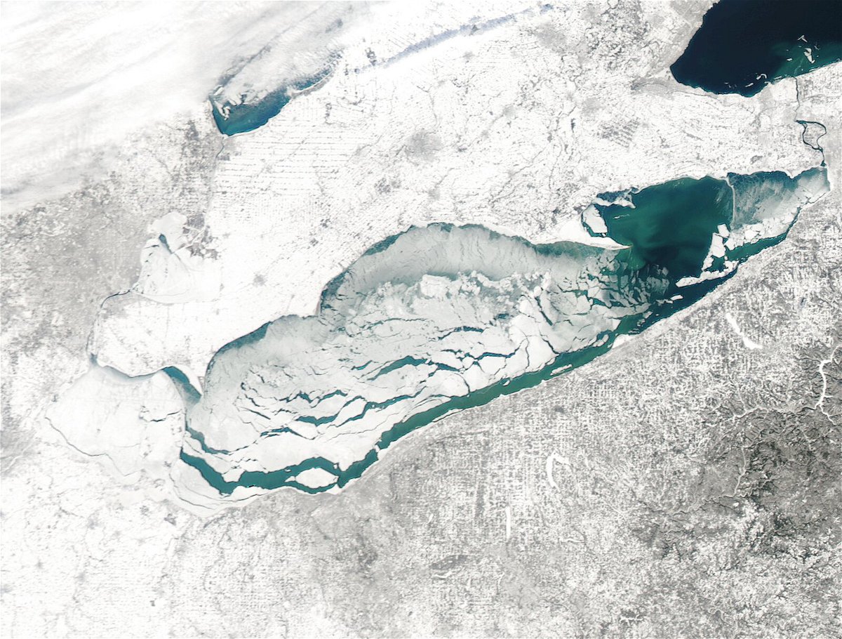 <i>NOAA</i><br/>A satellite image from the US National Oceanic and Atmospheric Administration shows the crack in the ice on Lake Erie Sunday.