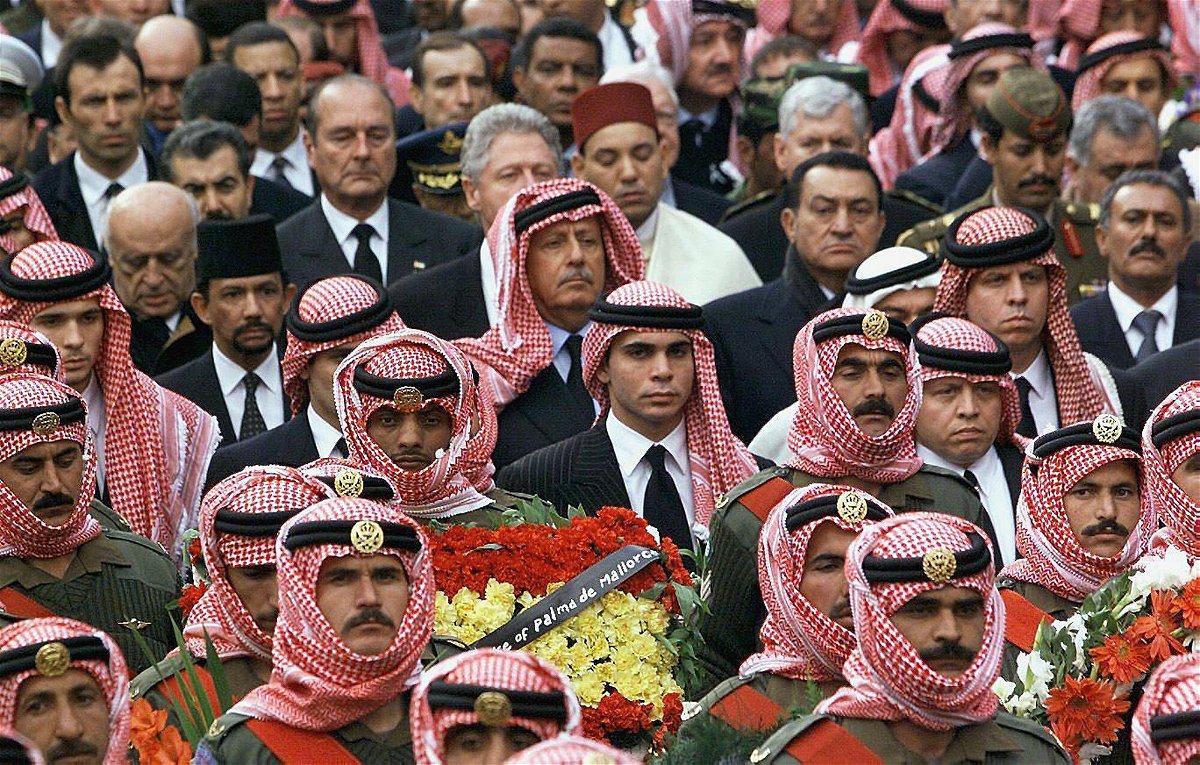 <i>Rabih Moghrabi/AFP/Getty Images</i><br/>Jordanian King Abdullah (R) and his brother Ali (C) accompany King Hussein's coffin on February 8