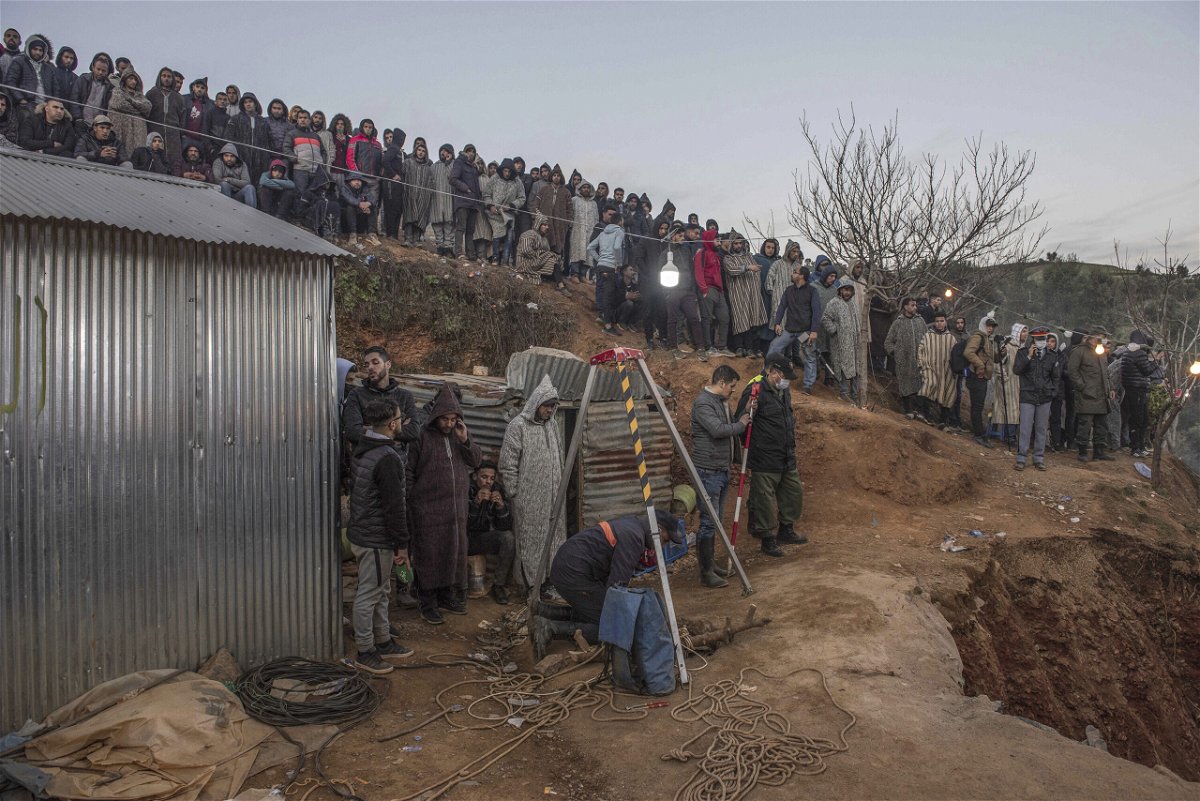 <i>AP</i><br/>Residents watch in concern as civil defense and local authorities dig in a hill as they attempt to rescue a 5 year old boy who fell into a hole near the town of Bab Berred near Chefchaouen