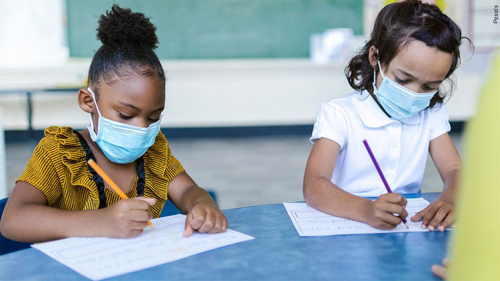 Children wearing masks in school