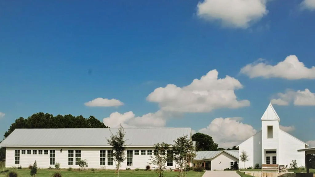 A chapel and buildings located at The Refuge, a foster care facility in Bastrop. Authorities say an employee is being investigated for allegedly obtaining photos of two girls under the shelter's care with the intent to sell them.