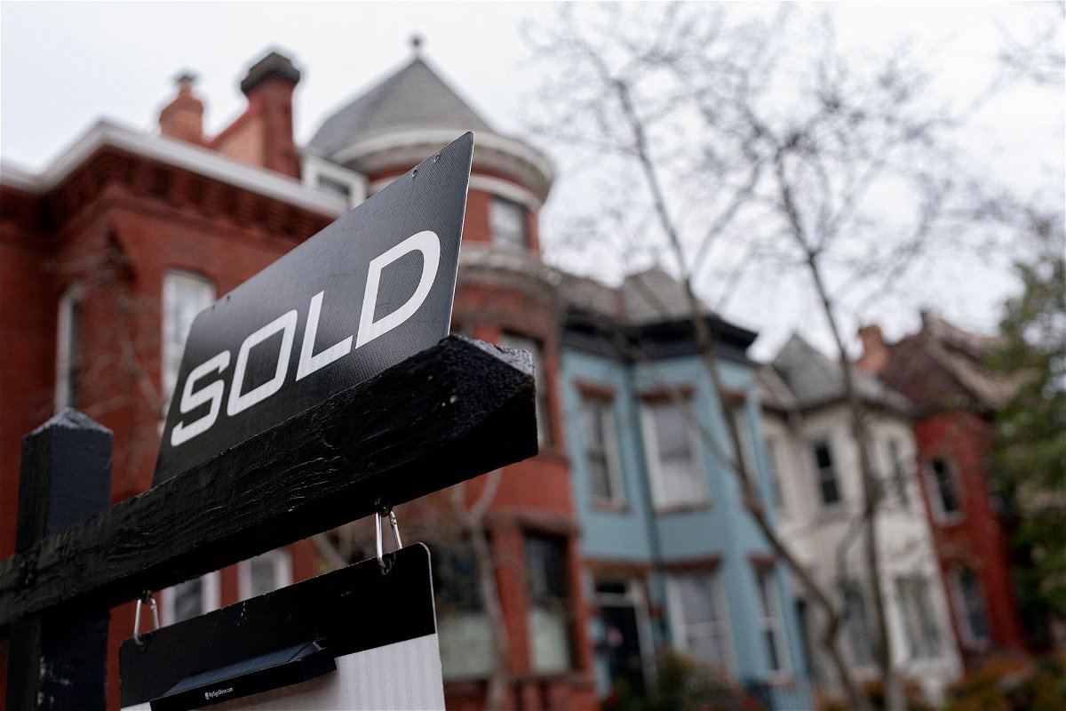<i>Stefani Reynolds/AFP/Getty Images</i><br/>A sold sign is posted in front of a house in Washington