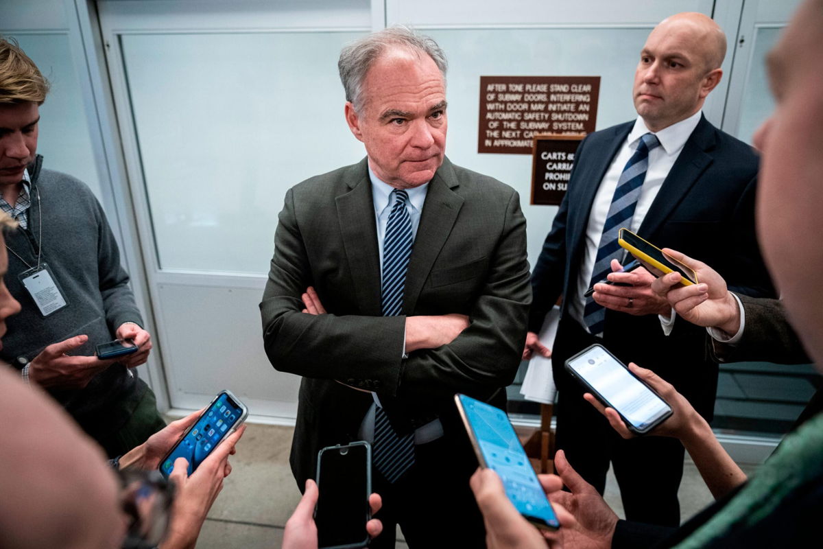 <i>Drew Angerer/Getty Images</i><br/>Sen. Tim Kaine speaks with reporters in the Senate Subway at the US Capitol in January 2020 in Washington