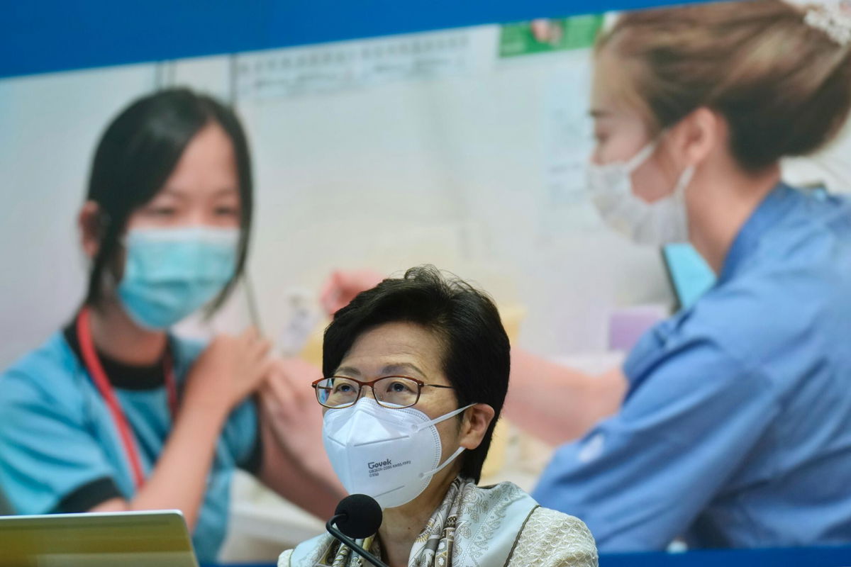 <i>Vincent Yu/Pool/Getty Images</i><br/>Hong Kong Chief Executive Carrie Lam during a press conference in Hong Kong on March 21. Hong Kong announced Monday that it will lift flight bans and shorten quarantine requirements.