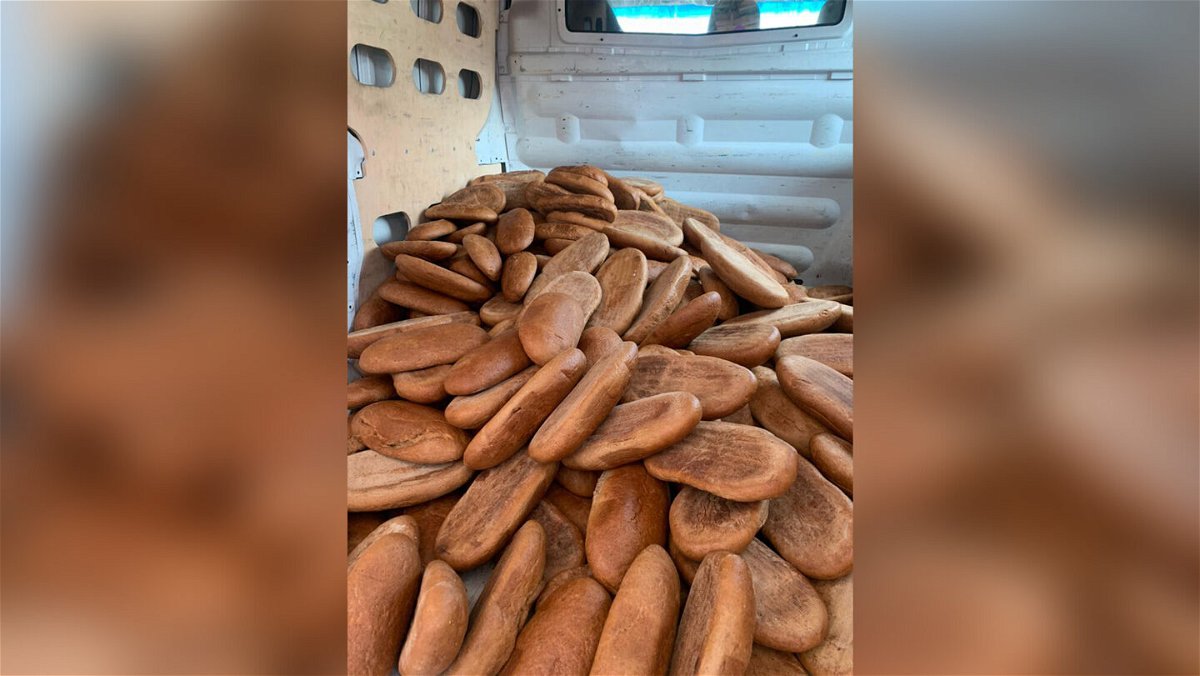 <i>Servetnyk Pavlo</i><br/>Servetnyk piles bread into the back of a truck to deliver it.