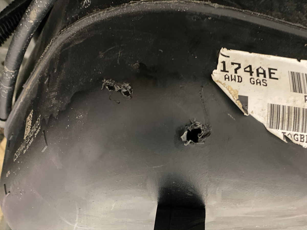 <i>Adrienne Broaddus/CNN</i><br/>The damaged gas tank which Gross Auto Group employees discovered.