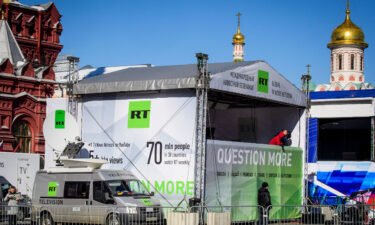 Britain bans Russian state TV channel RT. A RT broadcast tent is seen on Red Square