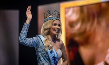 Miss Poland Karolina Bielawska waves after winning the 70th Miss World beauty pageant. The ceremony featured messages of support for Ukraine following Russia's invasion of the country