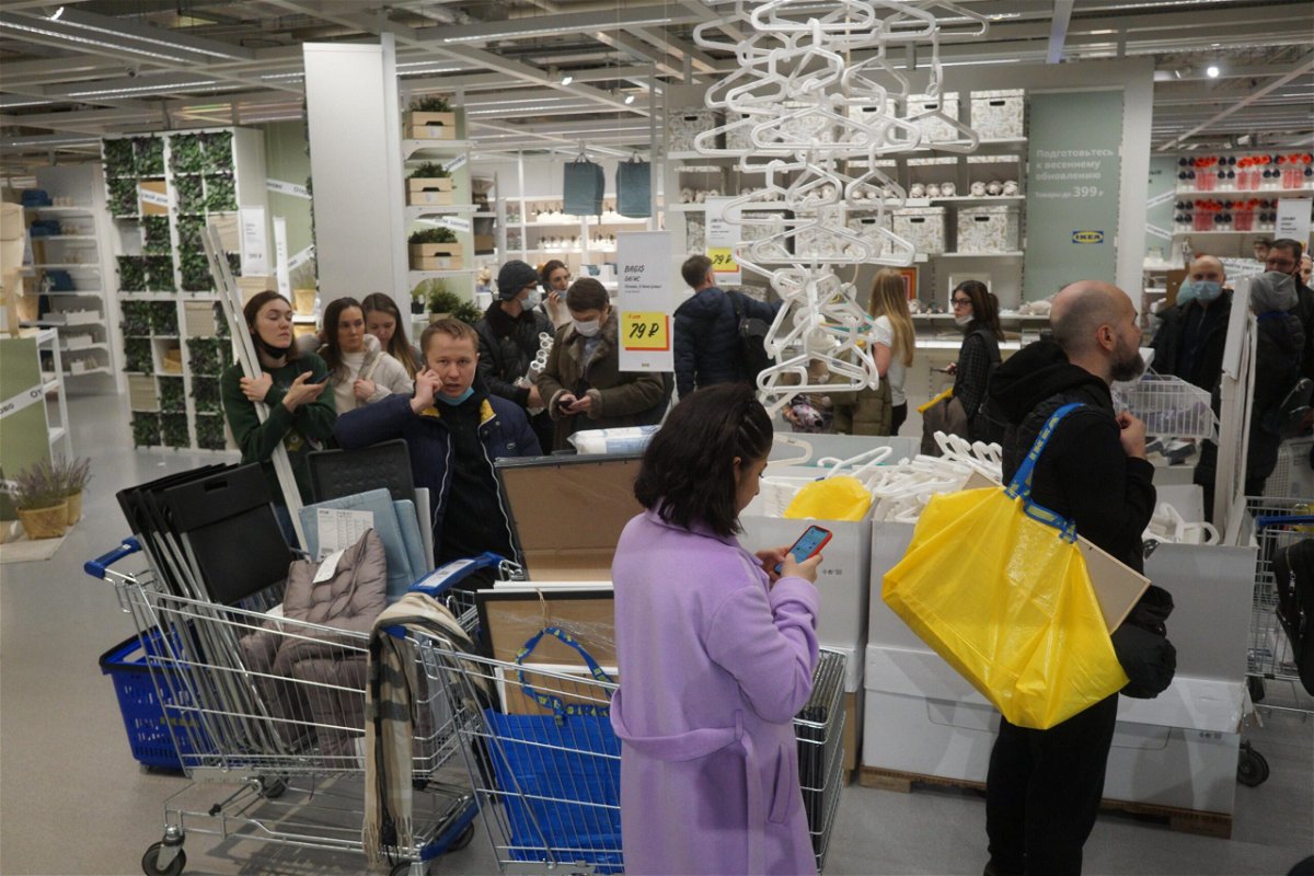 <i>Konstantin Zavrazhin/Getty Images</i><br/>Shoppers wait in a line to pay for their purchases at the IKEA store March 3