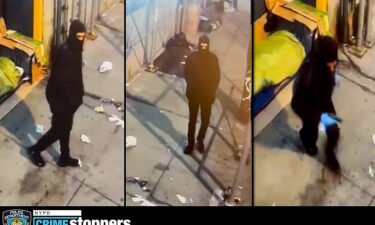 New York police released surveillance photos of the unknown armed suspect who shot two men Saturday.