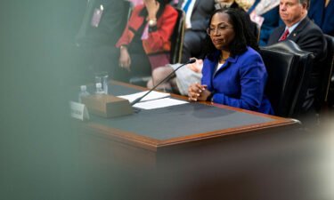 Judge Ketanji Brown Jackson listens on the first day of her Senate Judiciary Committee confirmation hearing to the United States Supreme Court on Capitol Hill in Washington