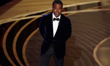 Chris Rock presents the award for best documentary feature at the Oscars on March 27. Chris Rock's brother