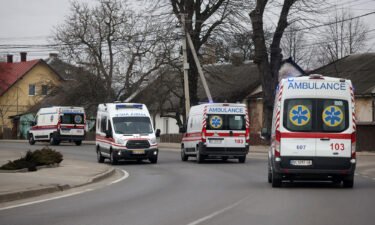Ambulances are seen traveling to and from the Yavoriv military base on March 13