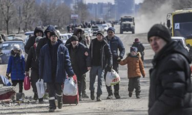 Residents leave the city of Mariupol which has seen intense fighting in recent weeks.