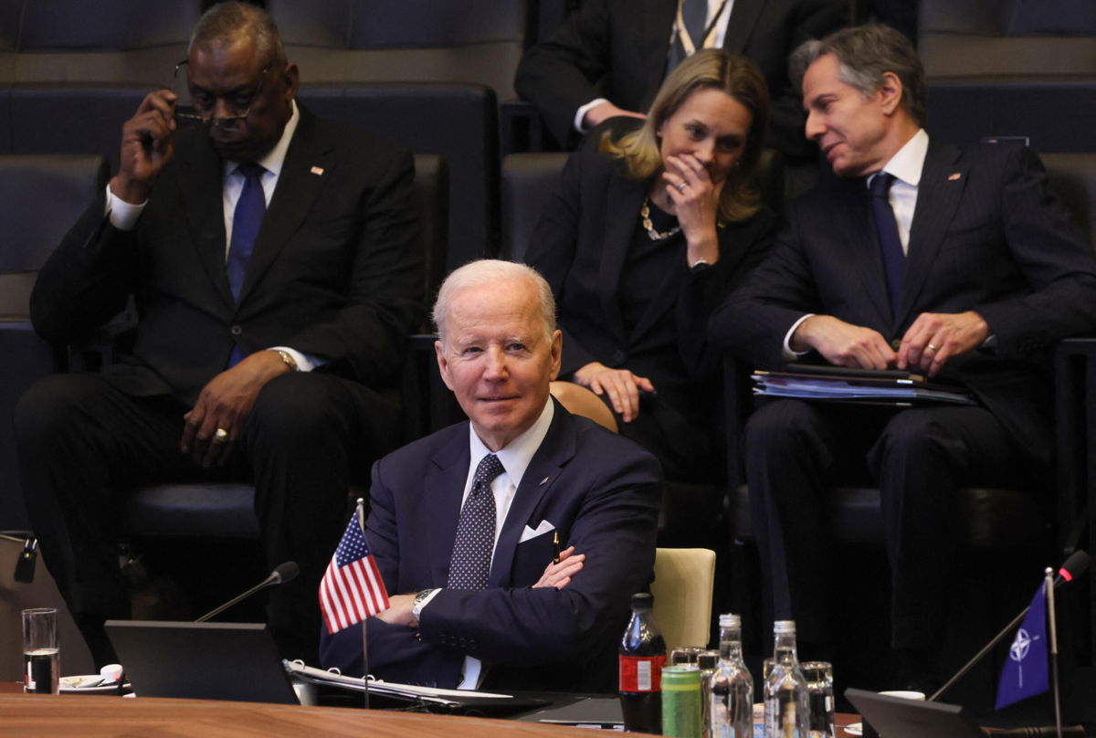 <i>Evelyn Hockstein/AFP/Getty Images</i><br/>U.S. President Joe Biden looks on as he attends a North Atlantic Council meeting during a NATO summit at NATO Headquarters in Brussels on March 24.