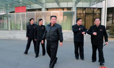This undated picture released from North Korea's official Korean Central News Agency (KCNA) on March 10 shows North Korean leader Kim Jong Un (C) inspecting the country's Aerospace Development Administration in Pyongyang.