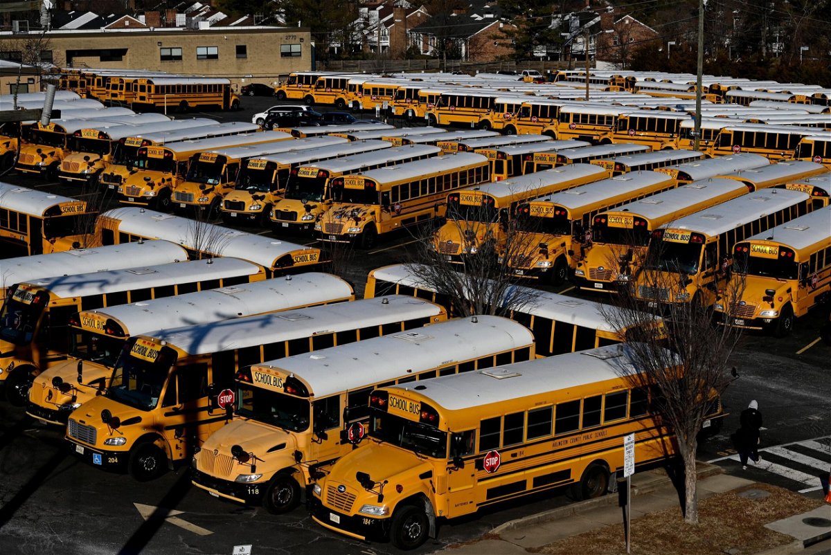 <i>OLIVIER DOULIERY/AFP/Getty Images</i><br/>School buses are parked at the Arlington County Bus Depot