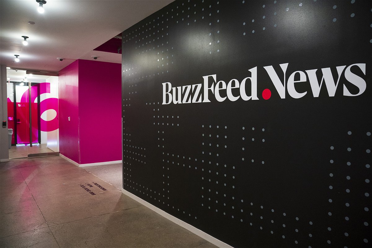 <i>Drew Angerer/Getty Images</i><br/>A BuzzFeed News logo adorns a wall inside BuzzFeed's headquarters in New York City in December 2018. BuzzFeed News announced on March 22 that its editor in chief is stepping down and the company is offering buyouts.