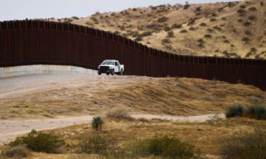 A US Border Patrol vehicle sits along the US-Mexico border between New Mexico and Chihuahua state in December 2021 in Sunland Park
