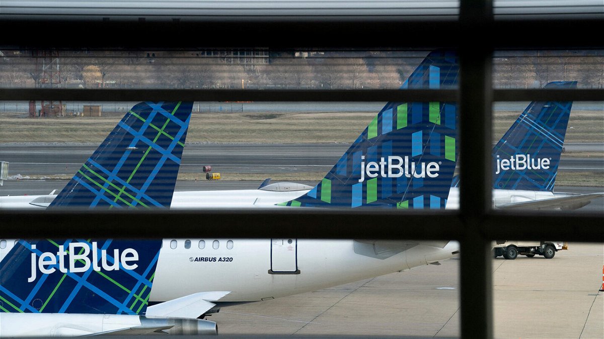 <i>Stefani Reynolds/AFP/Getty Images</i><br/>JetBlue planes sit at Ronald Reagan Washington National Airport in Arlington