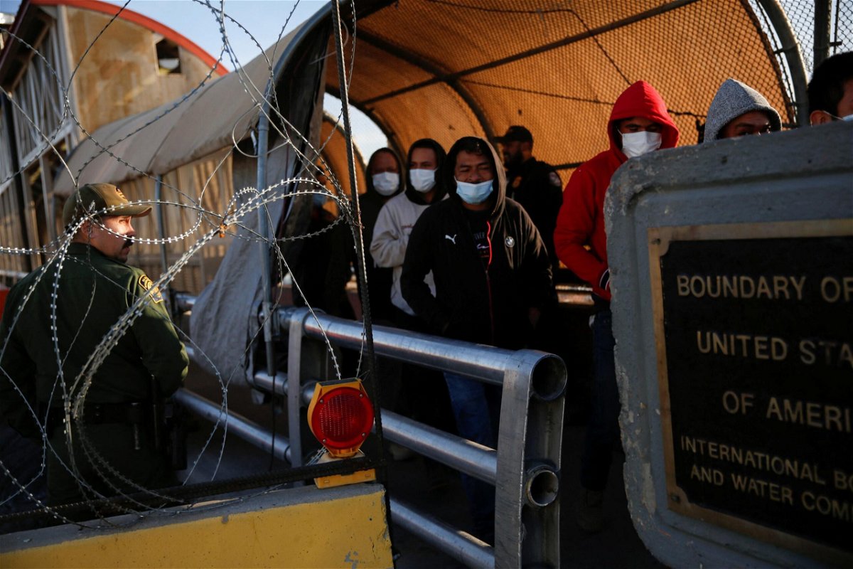 <i>Jose Luis Gonzalez/Reuters</i><br/>Seen here are migrants at the Paso del Norte International border bridge on April 1. The Biden administration is expected to lay out more of its plans for the US-Mexico border when a Trump-era pandemic restriction lifts.