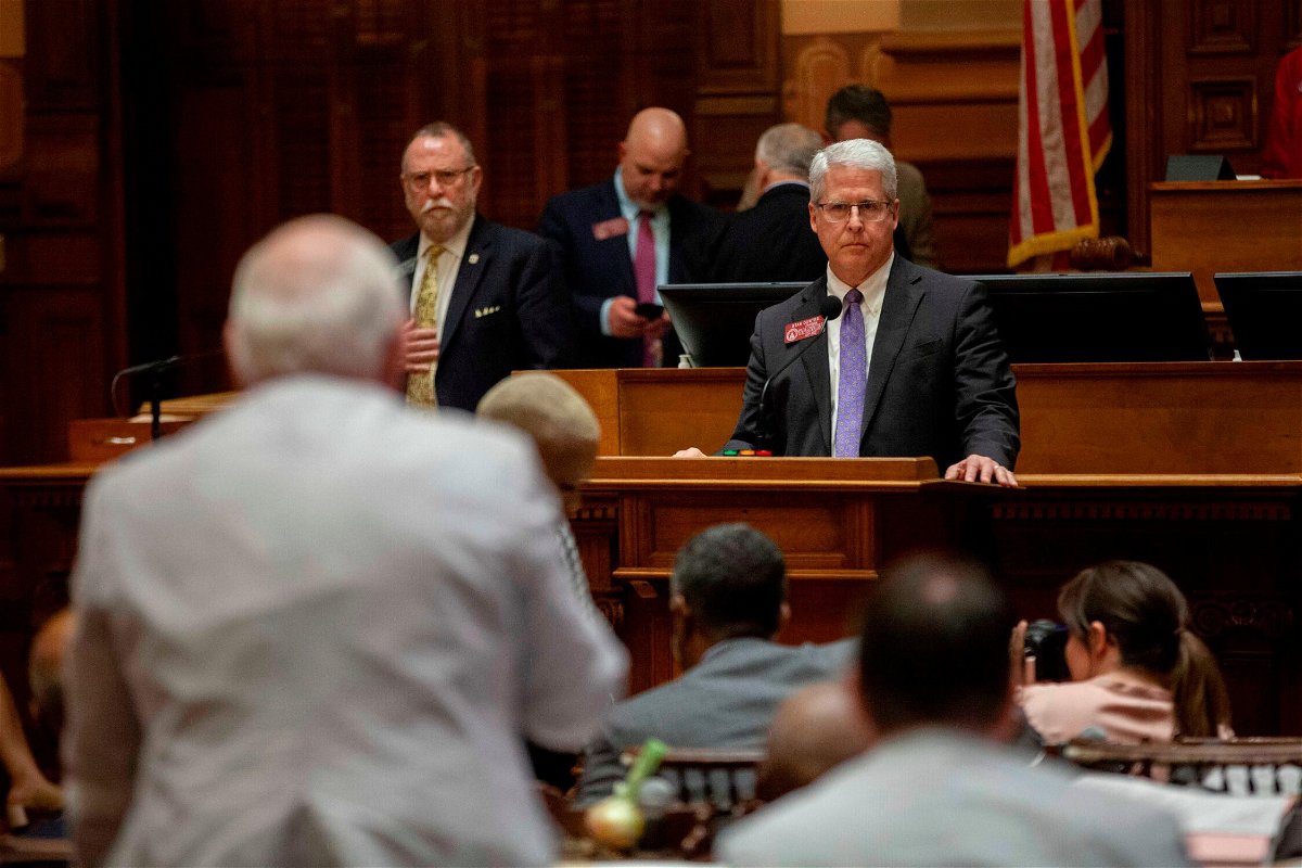 <i>Branden Camp/Atlanta Journal-Constitution/AP</i><br/>House Election Integrity Chairman Stan Gunter listens to a supporter of election bill SB 89 on Sine Die