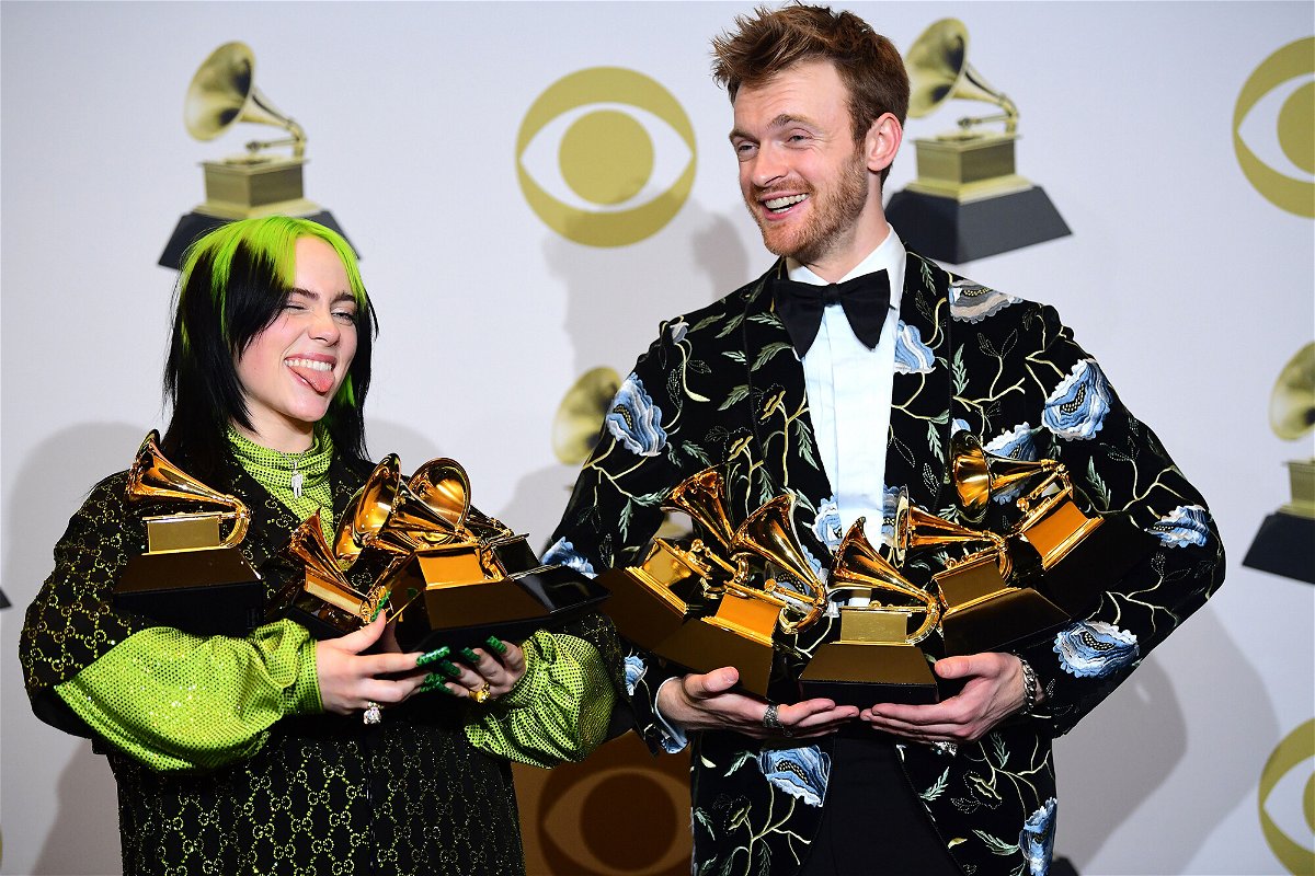 <i>Frederic J. Brown/AFP/Getty Images</i><br/>Billie Eilish and Finneas O'Connell are pictured with their Grammys in 2020. The Grammys are happening April 3 -- a little later than usual -- but happening nonetheless!