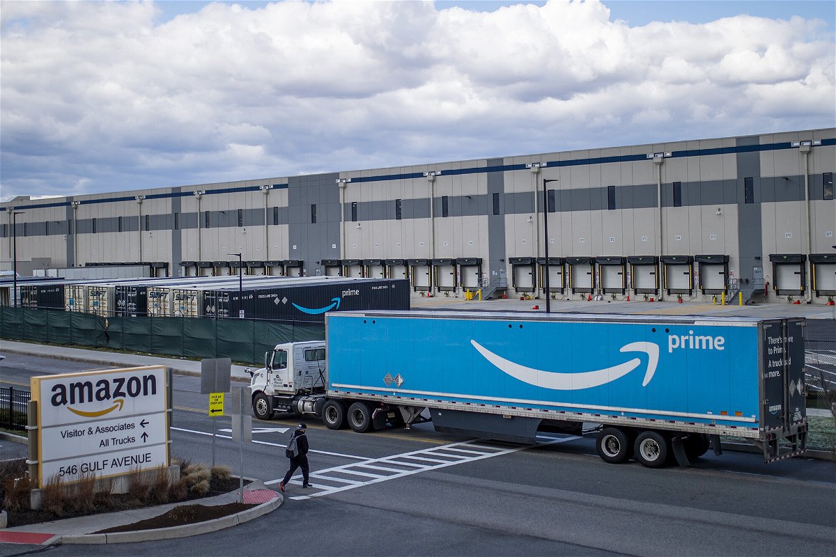 <i>Eduardo Munoz Avarez/AP</i><br/>A truck arrives to the Amazon warehouse facility on Staten Island
