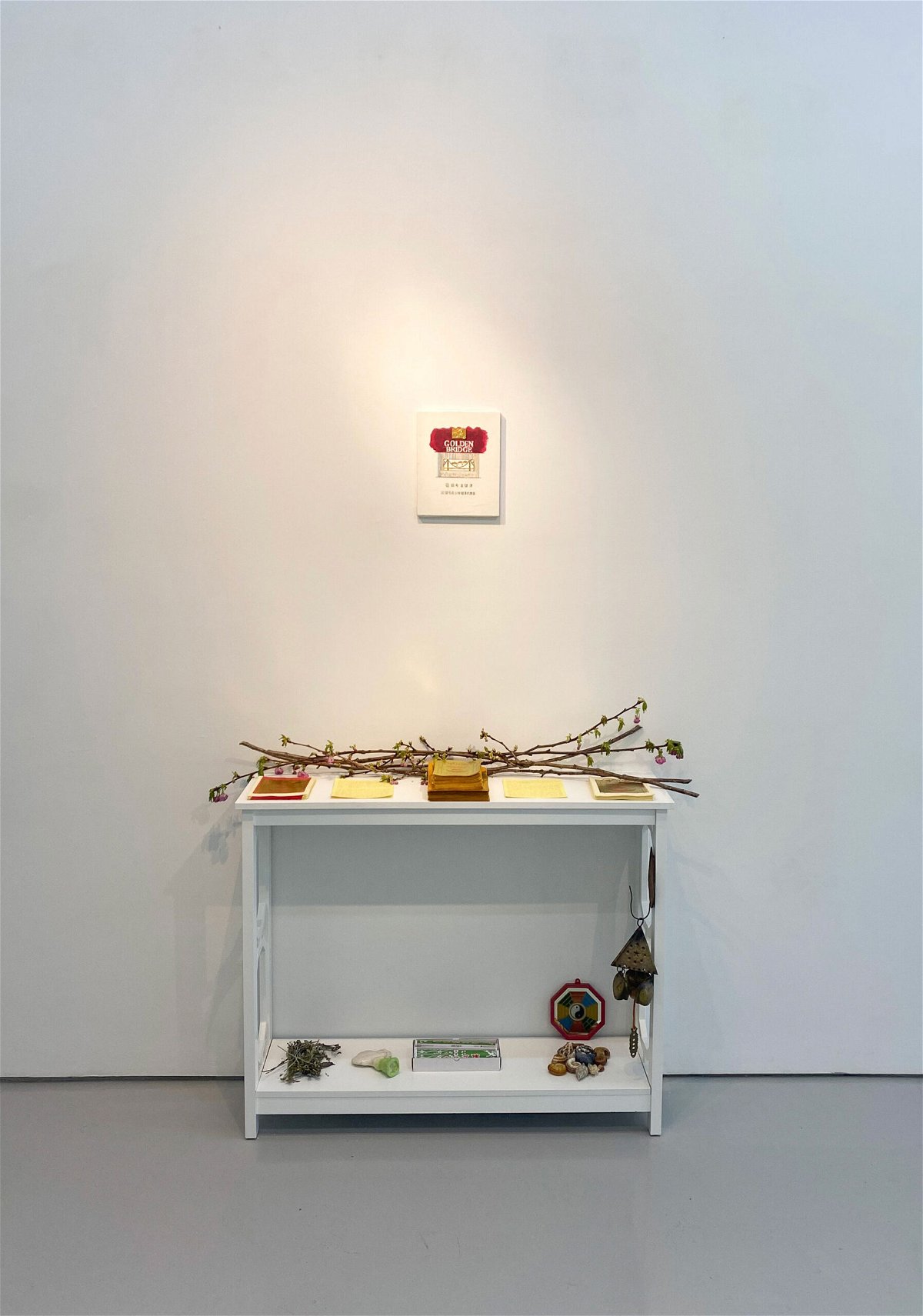 <i>Courtesy Phil Cai/Eli Klein Gallery</i><br/>An altar of offerings is placed below Lee's painting.