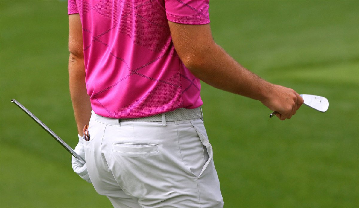 <i>Brian Snyder/Reuters</i><br/>Wolff holds a broken club after breaking it after his tee shot on the fourth hole.