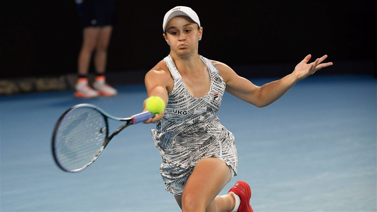 <i>Andy Brownbill/AP</i><br/>Ash Barty is a tennis grand slam title winner and played pro cricket. Now the Aussie star will feature in a leading golf event. Barty is seen playing at the Australian Open tennis championships on January 29.