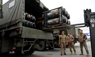 What happens to weapons sent to Ukraine? The US doesn't really know. Ukrainian servicemen are seen loading a truck with Javelin anti-tank missiles.