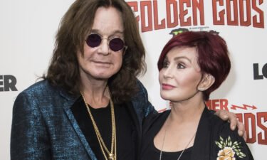 Ozzy Osbourne (L) and his wife Sharon Osbourne are seen here in London in June 2018. Sharon Osbourne is taking some time off from her new talk show after revealing her husband has Covid-19.
