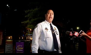 Atlanta Police Deputy Chief Timothy Peek briefs reporters on a shooting near Centennial Olympic Park.