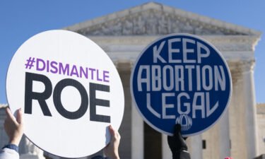 Pro-life activists counter-demonstrate as pro-choice activists participate in a demonstration outside of the Supreme Court on January 22