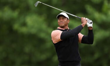 Woods plays his shot from the 14th tee during the third round of the 2022 PGA Championship.