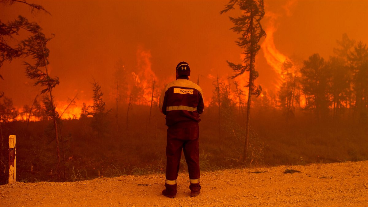 <i>Ivan Nikiforov/AP</i><br/>A forest fire near Kyuyorelyakh village at Gorny Ulus in Russia
