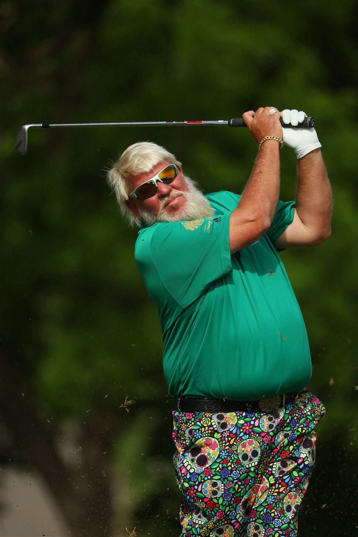 <i>Andrew Redington/Getty Images</i><br/>John Daly is living life to the fullest at the PGA Championship. Daly is seen playing his shot from the 11th tee during the first round of the 2022 PGA Championship.