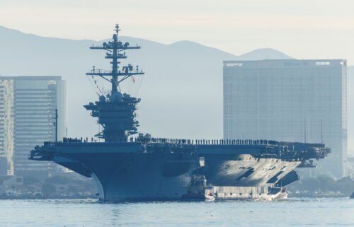The USS Abraham Lincoln makes history as thousands of service members deploy from San Diego Naval Air Station North Island under Capt. Amy Bauernschmidt