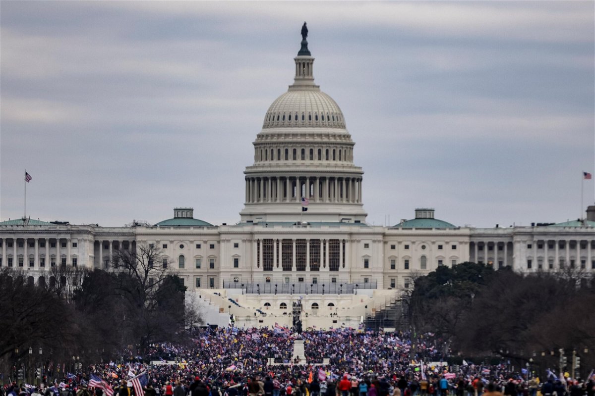<i>Samuel Corum/Getty Images</i><br/>Supporters of President Donald Trump surround the US Capitol on January 6
