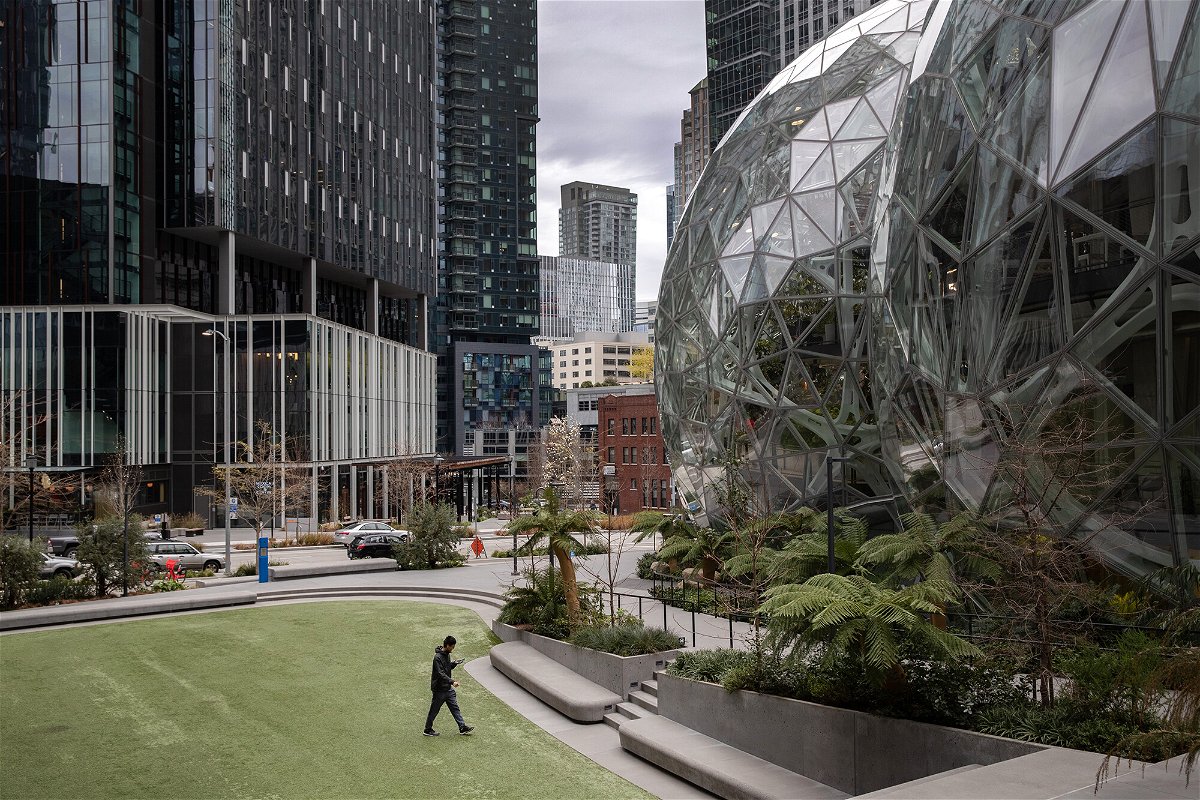 <i>John Moore/Getty Images/File</i><br/>Amazon ends its paid Covid-19 sick leave policy. Pictured are the Amazon headquarters on March 10