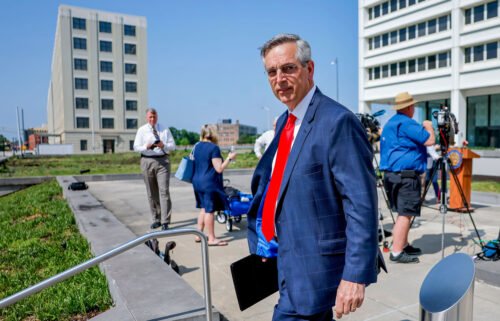 Republican Georgia Secretary of State Brad Raffensperger leaves after a news conference outside the Richard B. Russell Federal Building in Atlanta