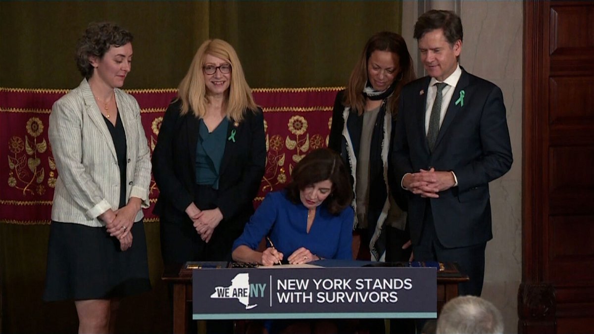 <i>New York Governor's Office</i><br/>New York Governor Kathy Hochul signed the Adult Survivors Act on May 24. The new law gives sexual assault survivors a one-year window to bring claims against abusers.