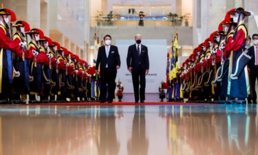 U.S. President Joe Biden and South Korean President Yoon Suk-youl are greeted by a guard of honour as they gather at a State Dinner at the National Museum of Korea in Seoul
