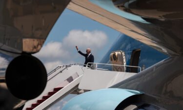 President Joe Biden signs a $40 billion aid package to Ukraine while in Seoul. Biden here boards Air Force One at Joint Base Andrews in Maryland on May 19