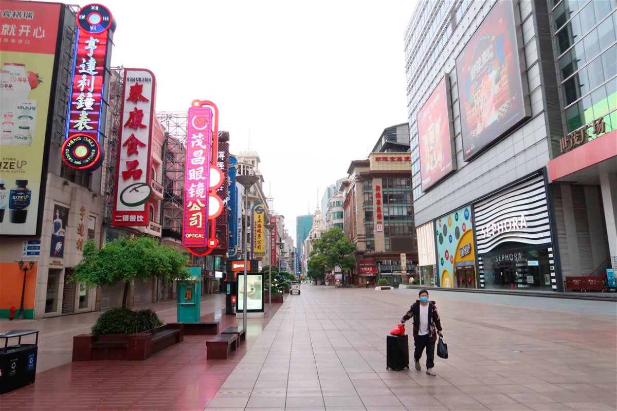 <i>VCG/Getty Images</i><br/>China's economy is going backwards. A near-empty Nanjing Road pedestrian street is seen during the May Day holiday on May 1