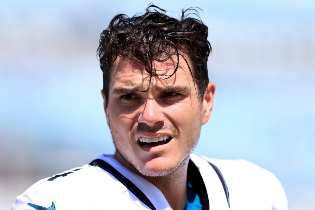 <i>Sam Greenwood/Getty Images</i><br/>Josh Lambo warms up prior to the Jacksonville Jaguars' game against the Arizona Cardinals at TIAA Bank Field in September 2021.